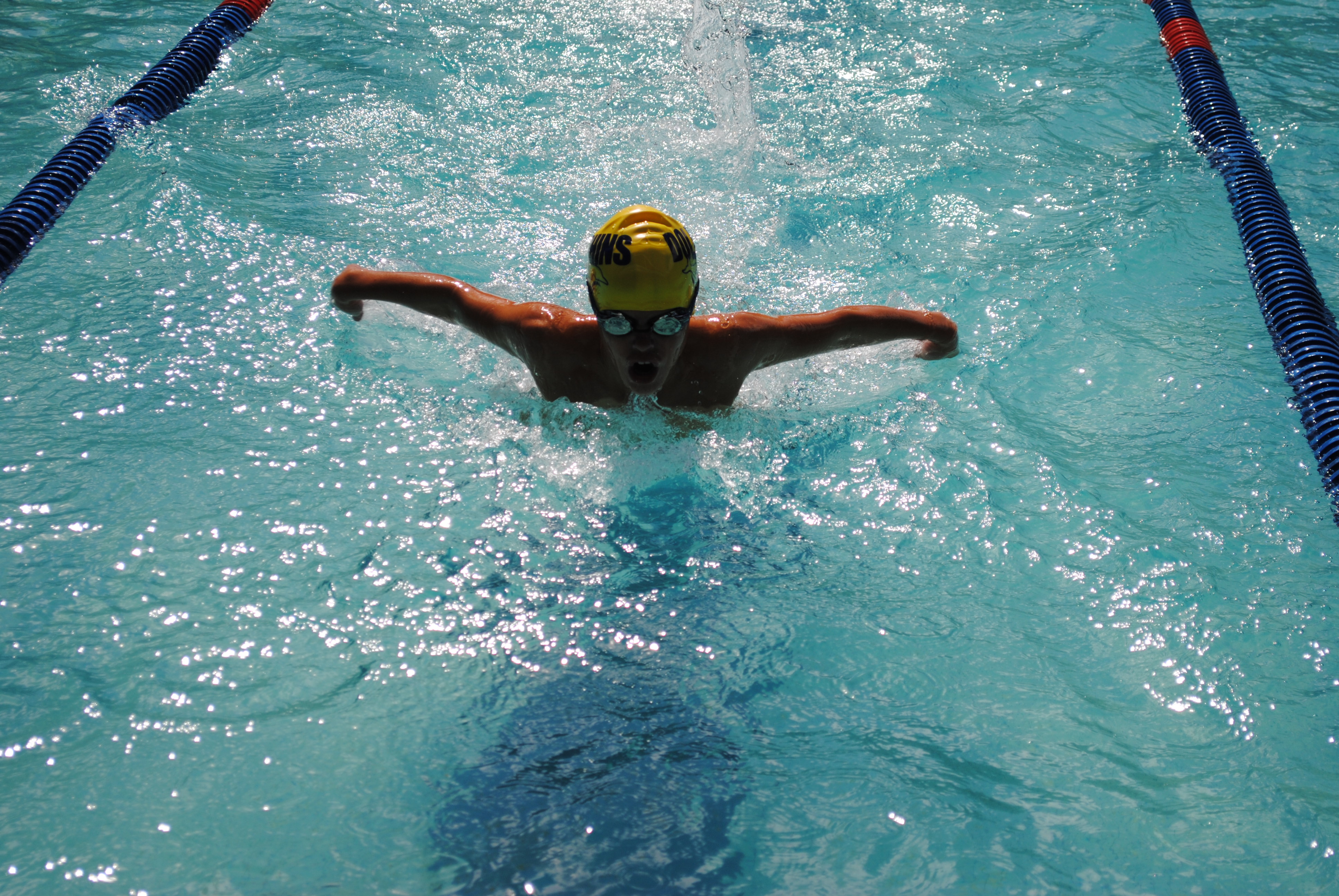 Matthew Mays competes in the butterfly swim