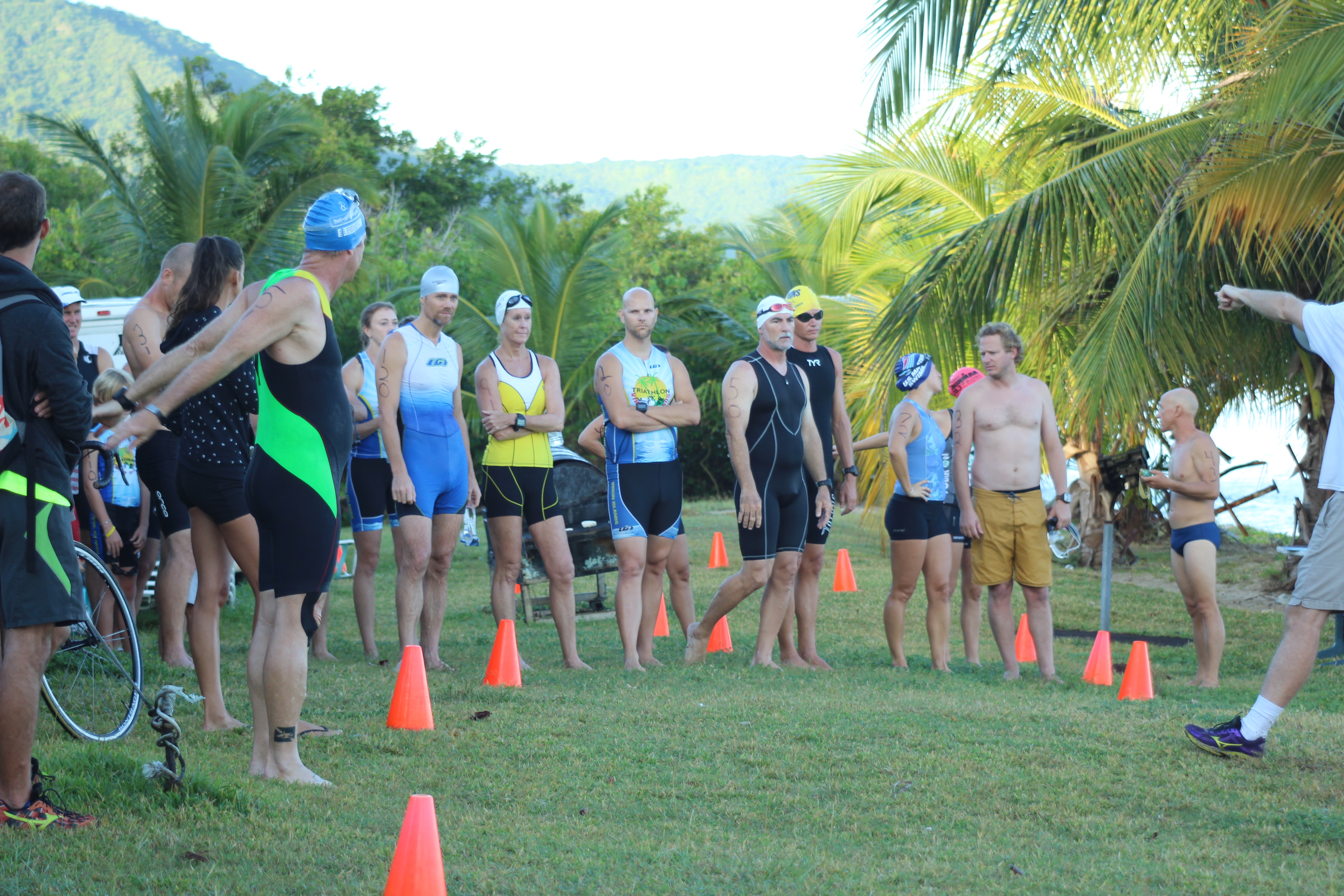 Triathletes listening to the course talk at Cane Bay (photo by Roger Hatfield).