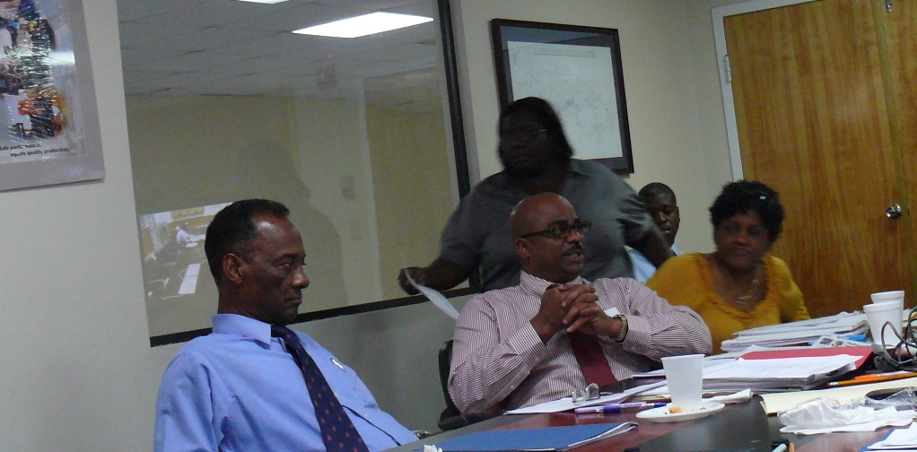 WAPA Chief Operating Officer Gregory Rhymer (center) talks about capital improvement plans while Director of Corporate Services Norris Griffin (left) and General Counsel Lorelei Farrington listen in.
