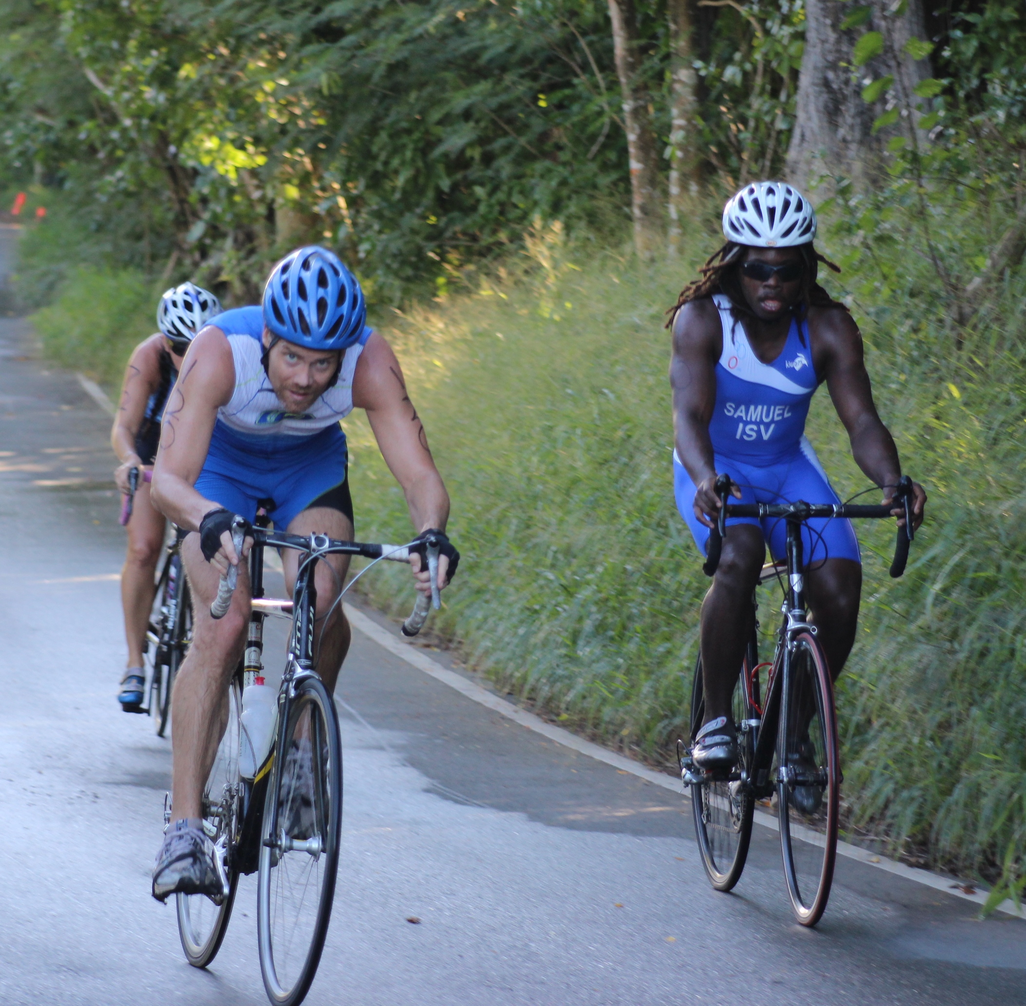 Jason Snow and Lukata Samuel on the bike course (photo by Roger Hatfield).