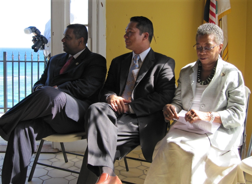 Gov. John dejongh Jr., assistant secretary Anthony Babauta, and Delegate Donna Christensen (from left) during Monday&rsquo;s check presentation ceremony at the NPS Visitor Contact Station at Salt River Bay.