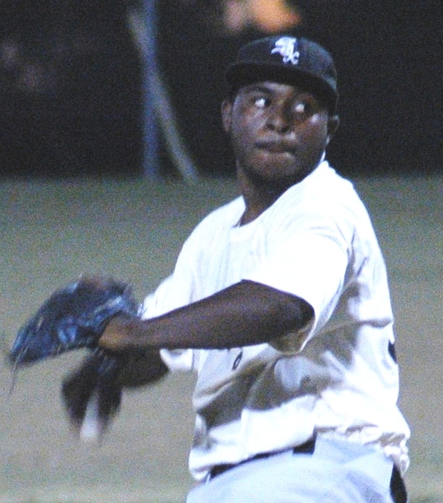 The murdered guard, Iver James Jr., pitching in a baseball game earlier this month.