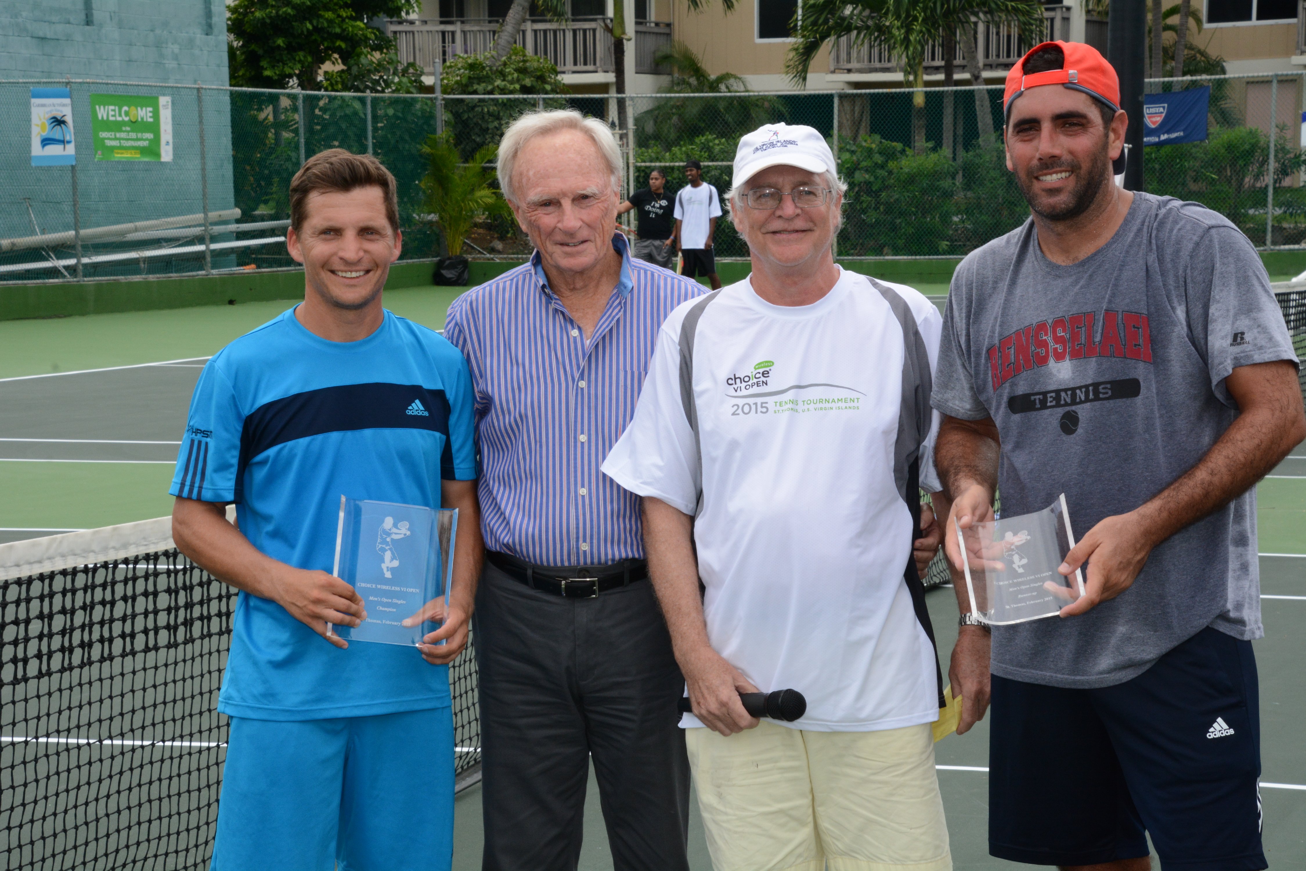 L to R -- Adrians Zguns of Latvia champion of the Mens Open Singles; Neil Prior, representing Choice Wireless; Bill Newbold, tournament director; Gabriel Montilla of Puerto Rico,  runner-up; finalist in Mens Open Singles. (Credit - Dean Barnes)