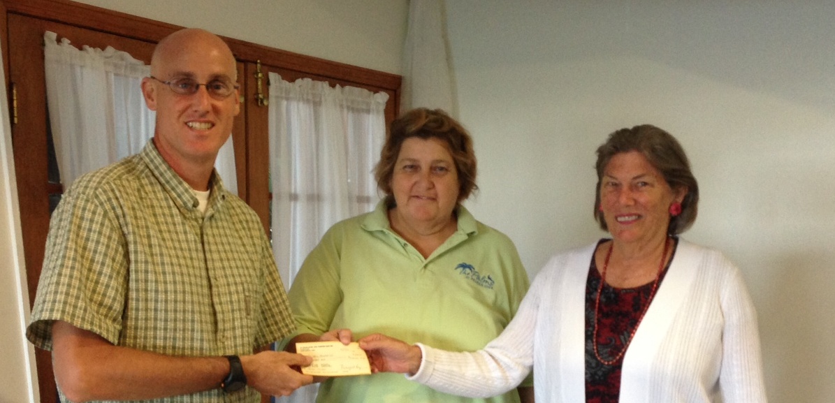 left to right:  Christopher Howell – Project Triage, Julie Printy – St. Croix Hotel & Tourism Assn. president, Margi Levy – St. Croix Hotel & Tourism Assn. treasurer