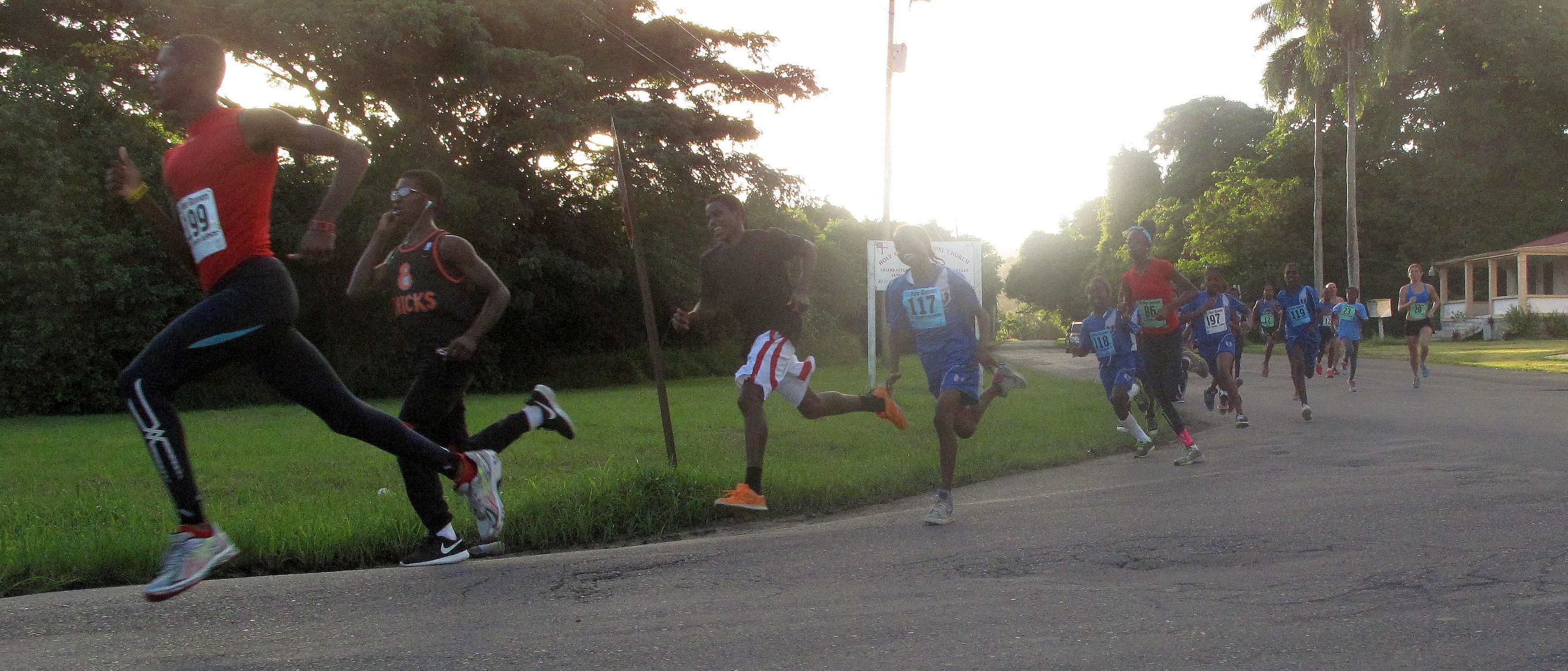 Runners led by Malique Smith No. 199 St. Croix Track Club are in the annual St.Croix Metric Mile (Photo by Wallace Williams)