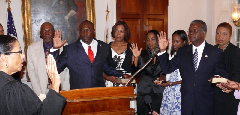 V.I. Supreme Court Justice Maria M. Cabret (far left) administers the oath of office to (hands raised, left to right) Police Commissioner Novelle Francis, Health Commissioner Julia Sheen-Aaron and Chief Labor Negotiator Valdemar Hill.
