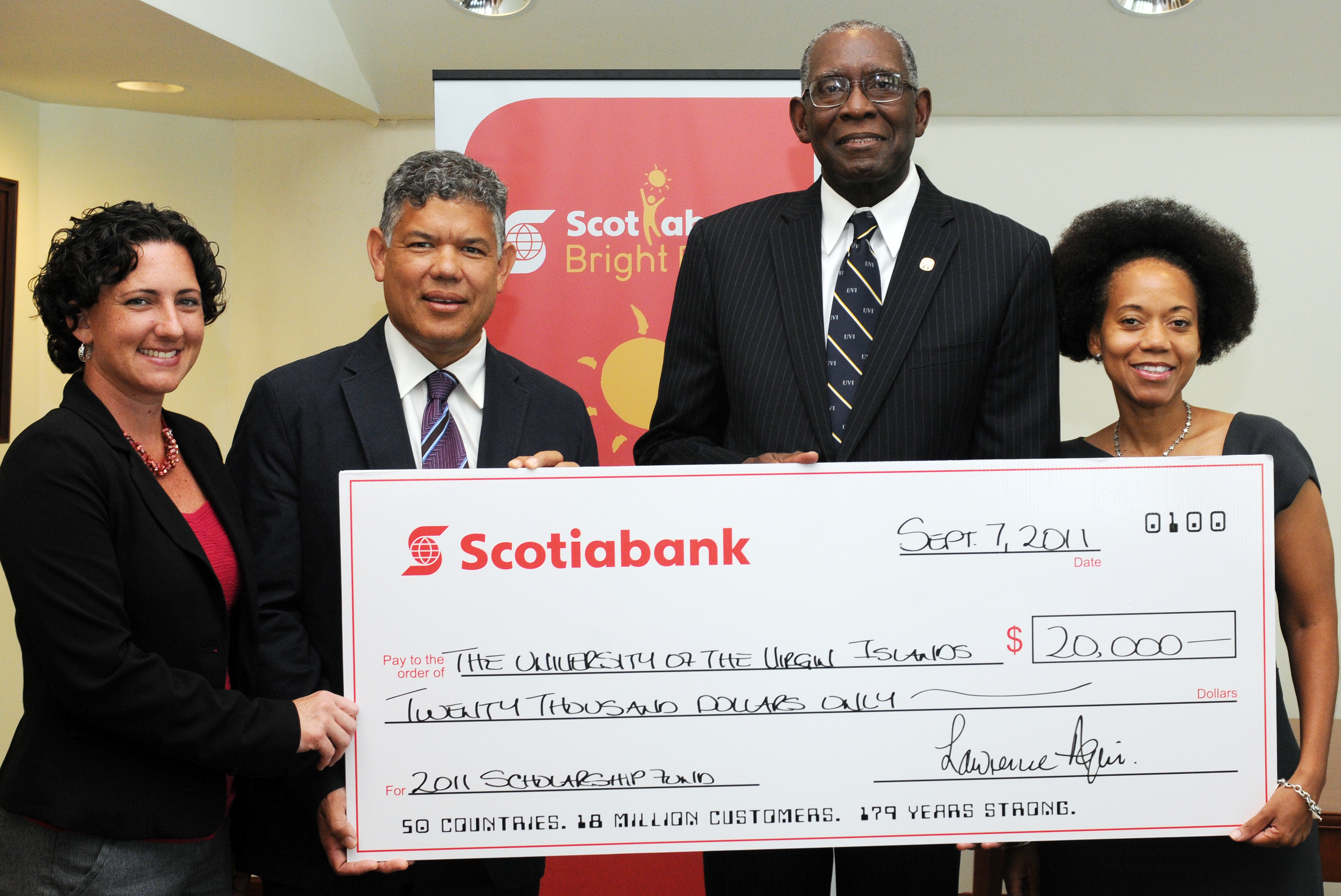 On hand for Scotiabank’s presentation of a check for $20,000 to the UVI Scholarship Fund on Wednesday, Sept. 7, were, from left, Scotiabank Marketing Manager Sadie Taylor-Clendinen, Scotiabank Vice President and Country Manager Lawrence Aqui, UVI President Dr. David Hall and UVI Vice President for Institutional Advancement Dionne V. Jackson. The presentation was made in UVI’s Administration and Conference Center on St. Thomas. (Credit - UVI Photos)