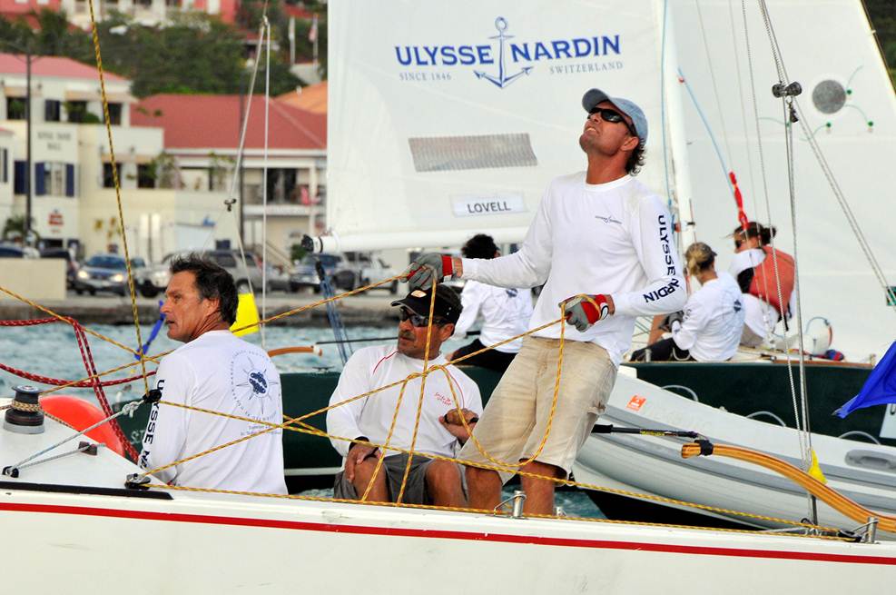  (L to R) U.S. Virgin Islands team-mates Maurice Kurg, America's Cup-winning helmsman Peter Holmberg, and Morgan Avery (standing) thrilled the crowd lining the scenic Charlotte Amalie Harbor waterfront for the hotly-contested 2009 Carlos Aguilar Match Race in St. Thomas last December.