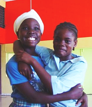 The Boys and Girls Club's first customers: Sheanijah Crabbe, 9, and Angelina Hodge, 8.