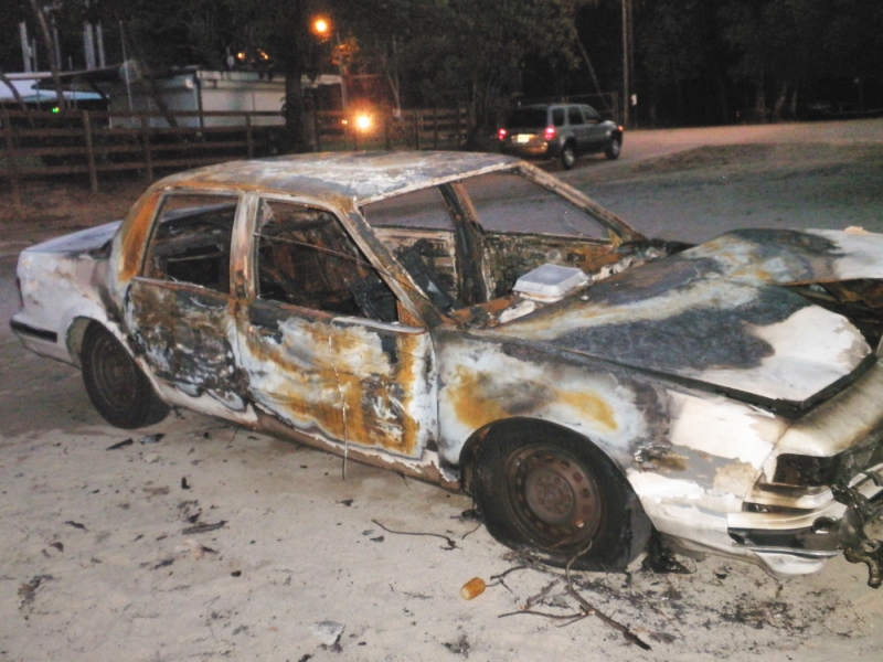This car owned by stabbing suspect David Carter was burned hours after the incident.