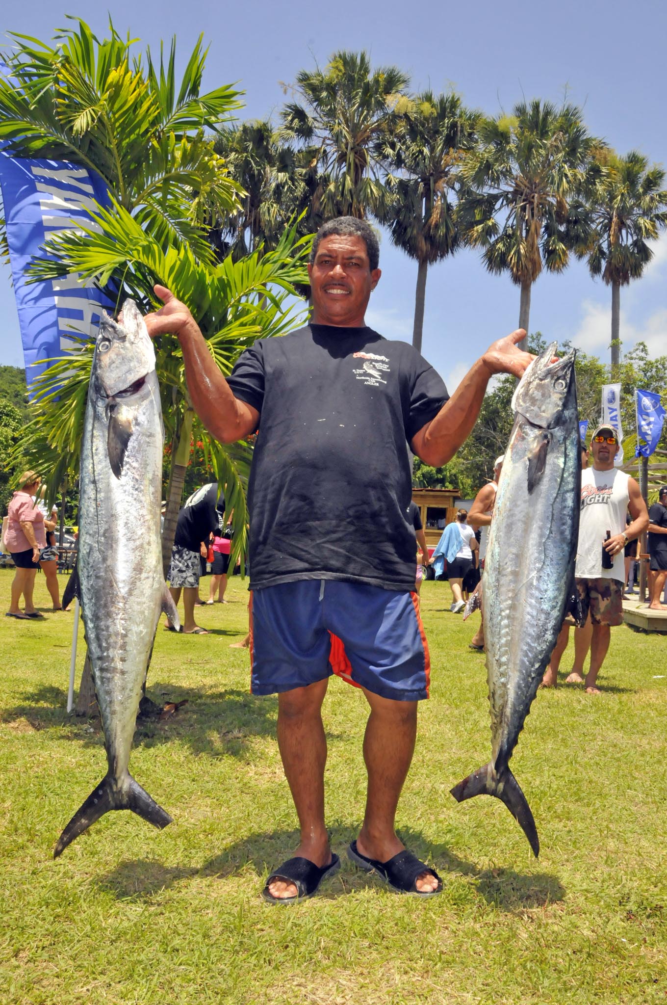 Ernest Quetel Sr. holds his Largest Kingfish and Second Largest Kingfish/ Credit: Dean Barnes/Northside Sportfishing Club