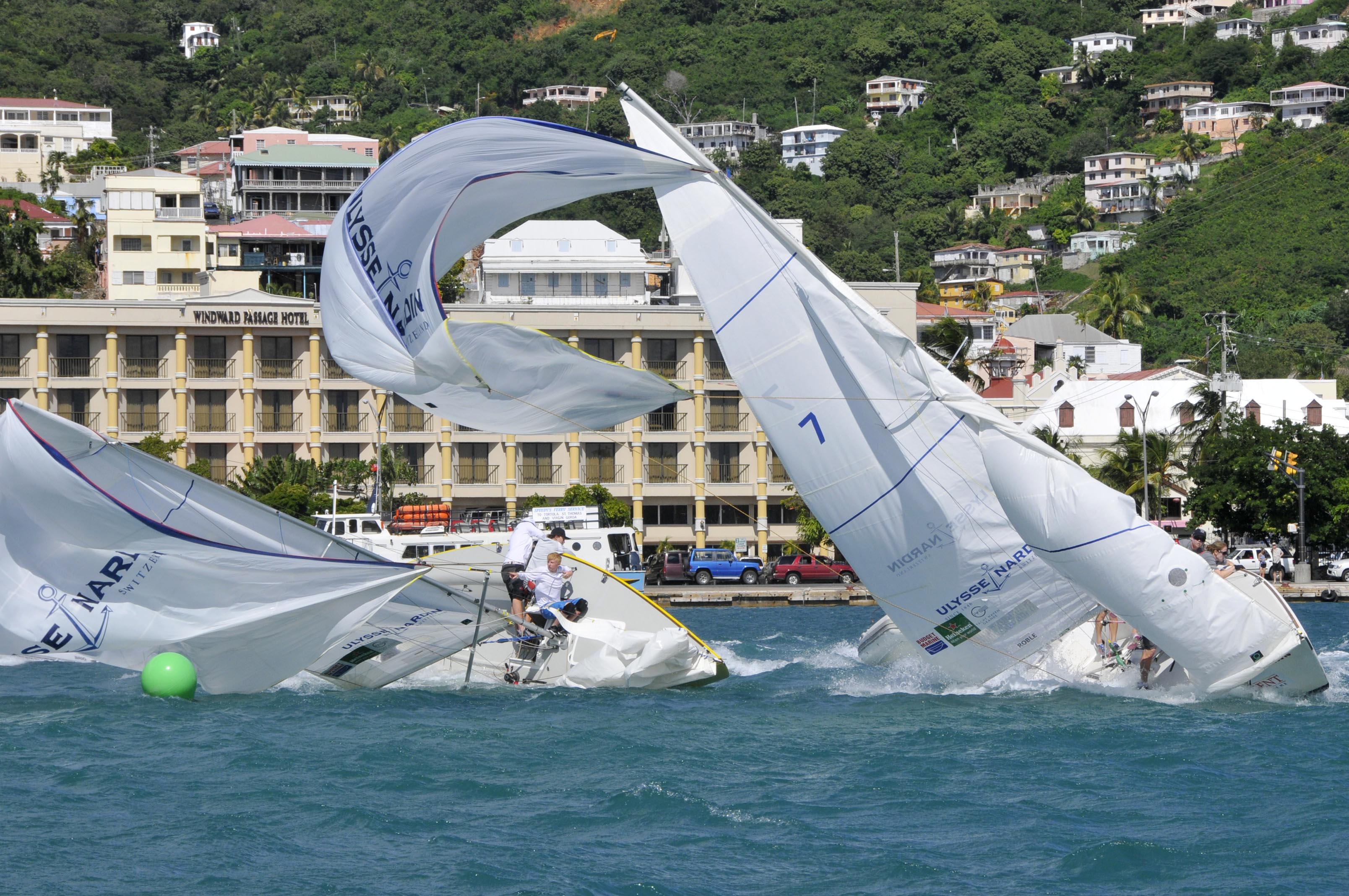 The USA’s Stephanie Roble (right) and USA’s Dave Perry (left) double broach while match racing on Saturday. (Credit: Dean Barnes)