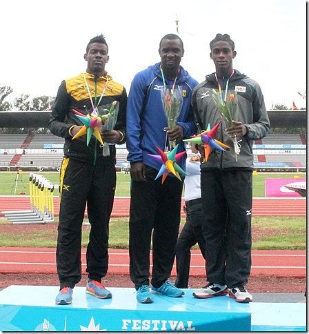 Eddie Lovett, on podium, after winning bronze medal. (photo by Mireille Smith)