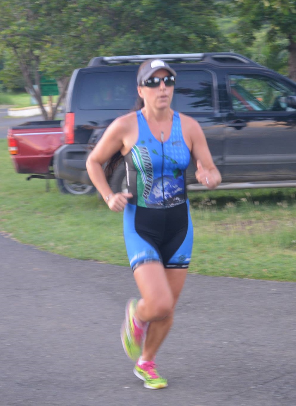 Esther Ellis finishing the 5K race.  Esther was the second place female in the 5K and first place female in the triathlon