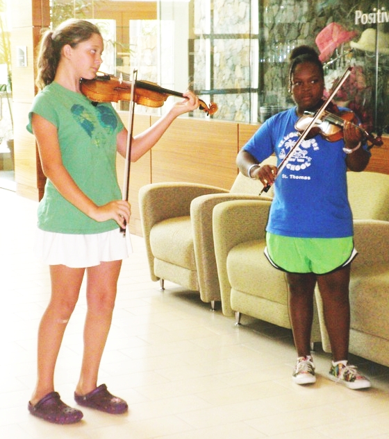 Alana Davis and Isis Collier entertained people waiting in line for screenings.