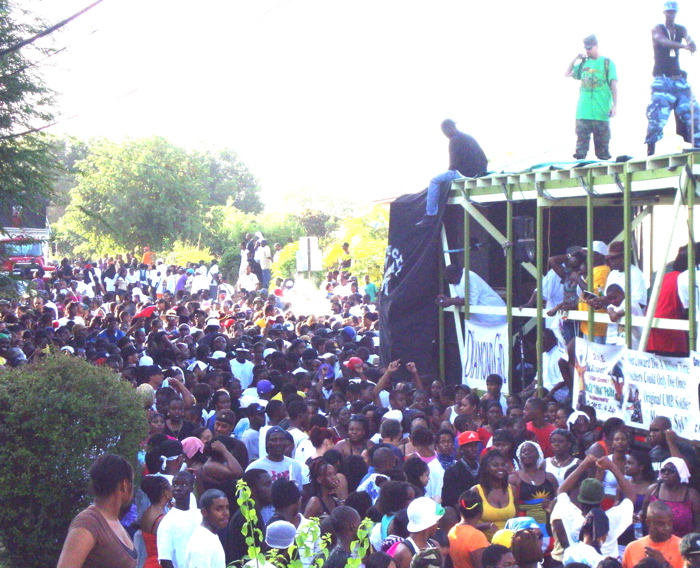 A sea of dancers crowds around UMB Soldiers during Wednesday's J'ouvert.