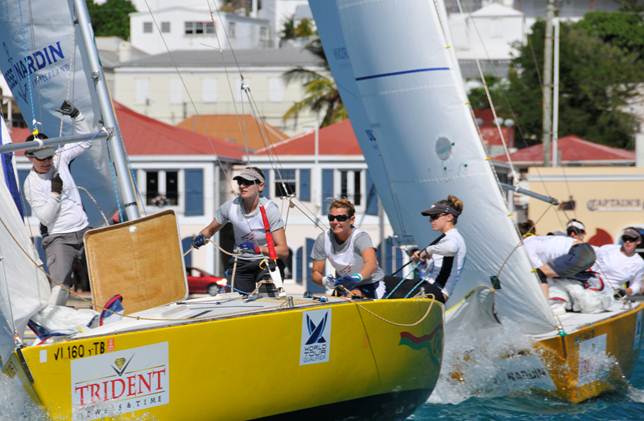 U.S. Virgin Islands-based photographer Dean Barnes image, provided copyright-free for editorial use, featuring: the USA’s 2010 Carlos Aguilar Match Race Women’s Division winner, Genny Tulloch, in her team’s final winning match to thunderous applause from spectators lining the scenic Charlotte Amalie Harbor waterfront. (Photo Credit: Dean Barnes)