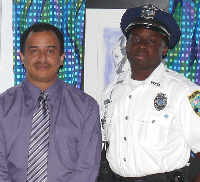 Detective Corporal Jose Silva (left) and Officer Gregory Bennerson Jr.