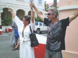 Local newlyweds Alix and Brad Preiss in the peace chain in Christiansted.