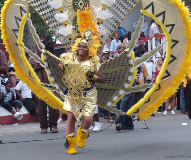 A dancer leads her troupe in the 2008-09 Crucian Christmas Festival parade. This year's festival kicks off Friday with the opening of the Mini-Village in Christiansted.