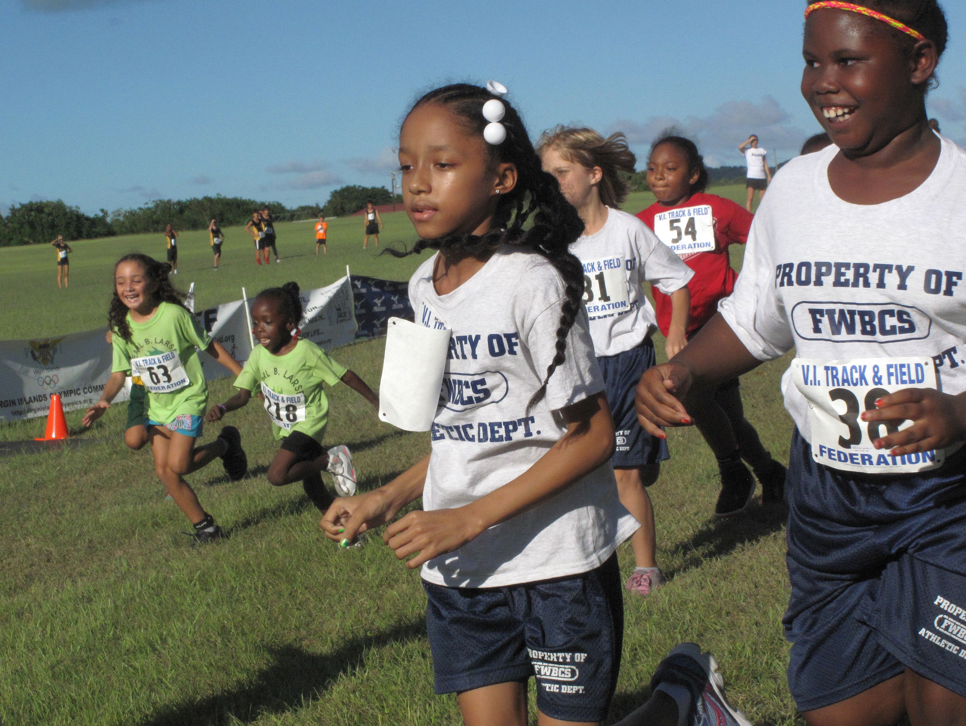 Elementary school girls competing in 4H/V.I.Pace Runners Cross-Country Series