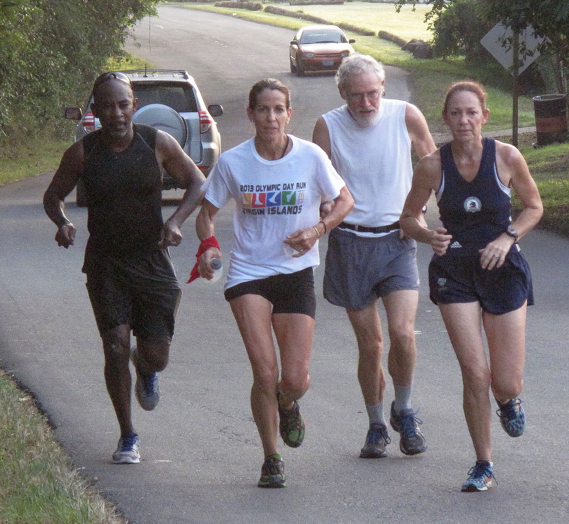 (left to right) Marlon Williams and Ana Gutierrez Olympic Marathon Runners; Roger Hatfield and Theresa Harper Triathletes approach the 10 mile mark of The 29th Annual Martin Luther King Fort-To-Fort Memorial Run