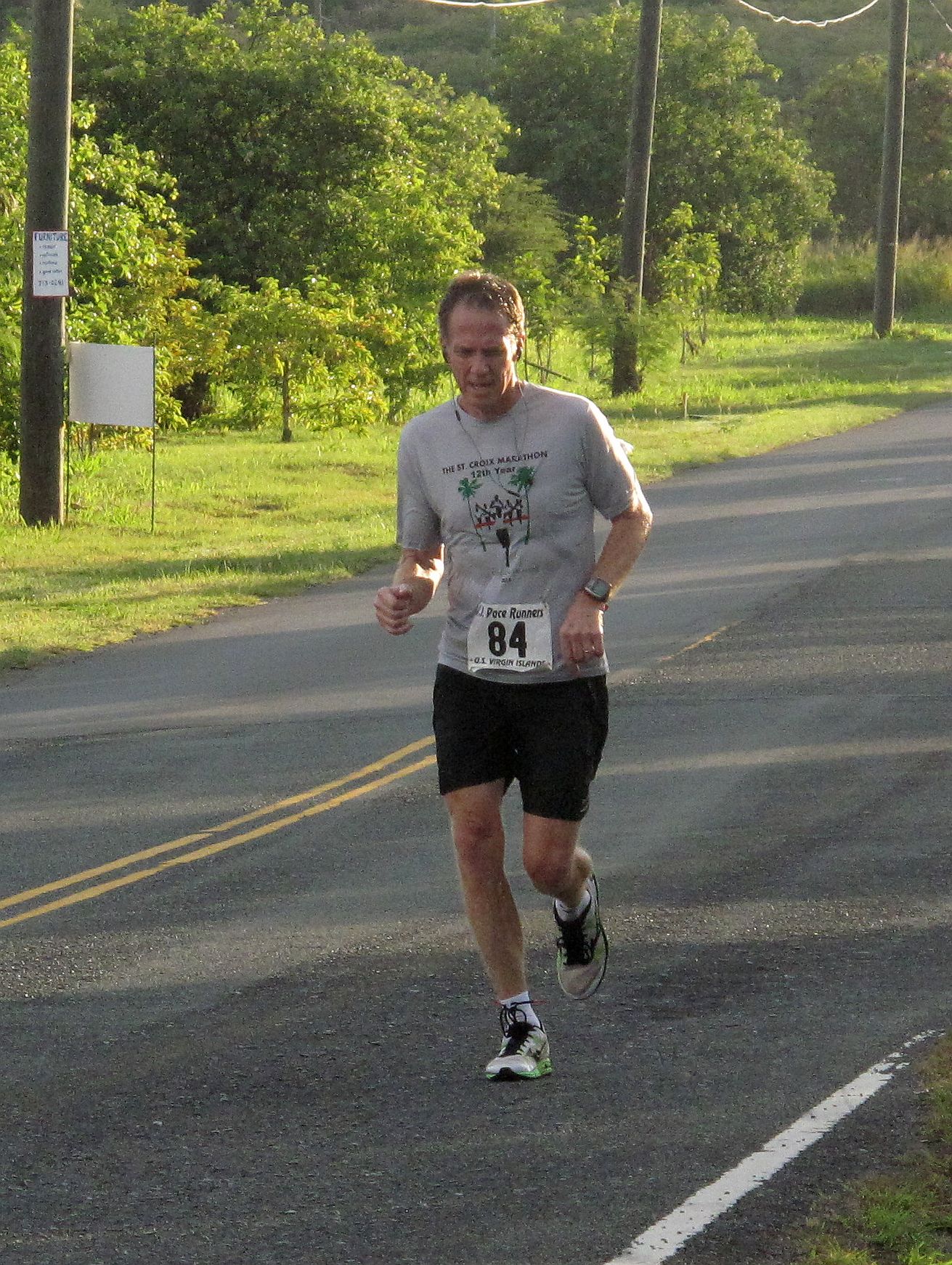 John Harper wins by predicting his time in the West Indies Lab 5-Mile Road Race.