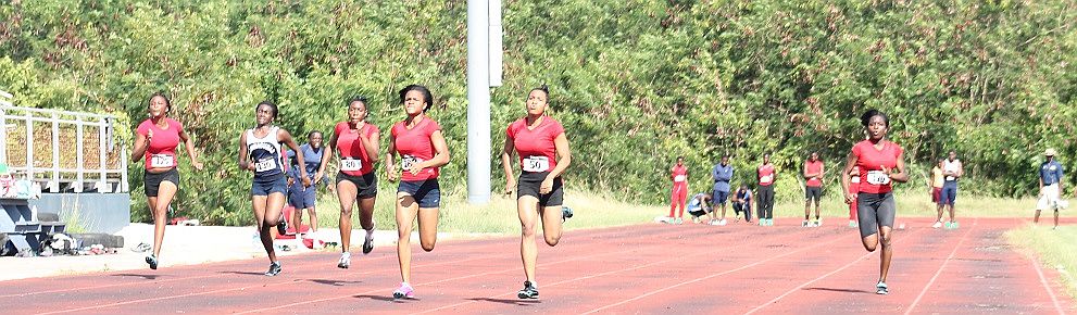 Nia Jack (4th from left) and Kayla King in 100m