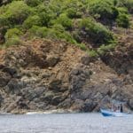 A boat rides near Inner Brass Island off the northern coast of St. Thomas during the 29th Annual Bastille Day Fishing Tournament_Photo by Kelsey Nowakowski