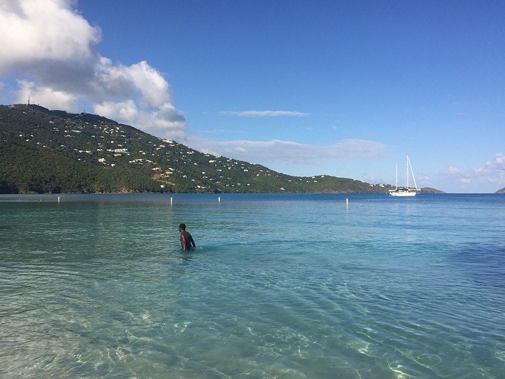 A many enjoys an early morning swim at Magens Bay. Such simple pleasures are on hold due to Gov, Albert Bryan Jrs.. order closing the beaches. (Source file photo by Kelsey Nowakowski)