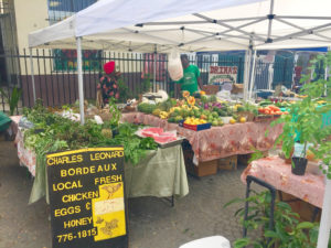 Charles Leonard’s produce stand is full of local produce at Market Square. 