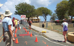 In the 2015 Ironman Lauren Goss begins the 13.1 mile foot race, and was the first across the finish line. (Susan Ellis photo)