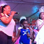 Shakima Jones and daughter Sequoia Sprauve belt out the Virgin Islands March.