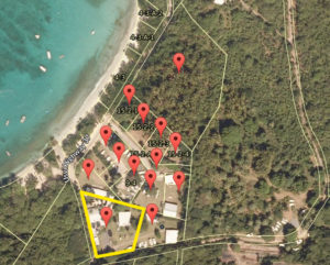 Magen’s Bay Management, LLC, bought 15 parcels in Hull Bay, 14 of which are indicated here. The parcel Hull Bay Hideaway sits on is outlined in yellow. 