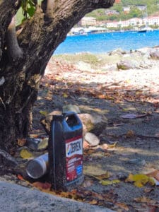 Containers like this antifreeze jug at Vessup Beach are among the debris frequently on local shores. (Photo by Kristina Edwards)