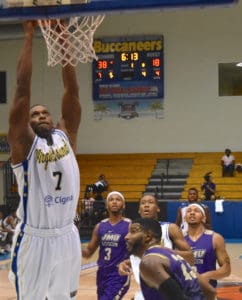 Cuthbert Victor jams home two of his game-high 21 points over James Madison.