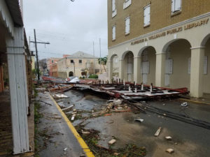 Debris blocks King Street in Christiansted in front of the Florence Williams Library the morning after Hurricane Maria hit St. Croix.