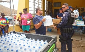 Crew from Coast Guard Cutter Joseph Napier offload 450 liters of water to Coral Bay, St. John. Napier's crew also provided diesel fuel to the local fire department. (U.S. Coast Guard photo)