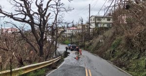 Police patch a collapsing portion of St. Peter Mountain Road on St. Thomas. (James Gardner photo)