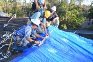 Contractors install roofting material for Project Blue Roof in this Florida photo from the Army Corps of Engineers. Emergency recovery programs such as this could suffer under a suggestion that Trump use the money for his proposed border wall.