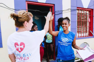Cane Bay Cares volunteers distribute water to the Boys and Girls Club in Christiansted. (Photo by Nicole Canegata)