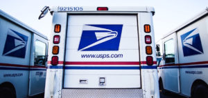 U.S. Postal Service trucks lined up and ready to go. (U.S. Postal Service image)