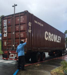 From left, Troy de Chabert-Schuster, Omar Haedo, Wanda Ruben, Deanna James, discuss the shipment of medical supplies the Juan F. Luis Hospital received Tuesday.