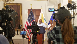 News media gather to cover Gov. Kenneth Mapp's daily news briefing Monday at Government House.