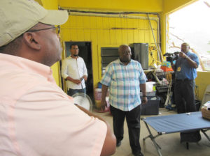 Gov. Kenneth Mapp views the damage at the Coral Bay Fire Station caused by Hurricane Irma.