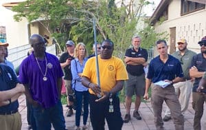 WAPA line superintendent Richard Lanclos demonstrates a model of the new composite poles that will be used on St. John.