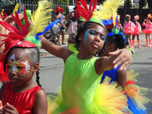 School children dance down King Street during the 2016 Children’s Parade. This year the Children's Parade will be merged with the Adult Parade. (Susan Ellis photo)