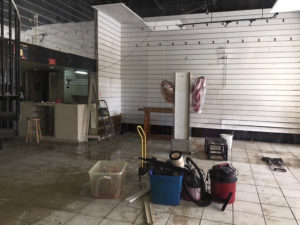 The original site of Clara’s Special Occasions stands empty but cleaned of debris and water damage after Hurricane Maria.
