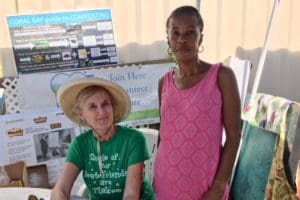 Sharon Coldren of Coral Bay Community Council and Linda Titre, a Hard Labor resident, enjoy the Bizarre Bazaar.