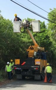 WAPA workers repair electrical lines after September hurricanes. (File photo)